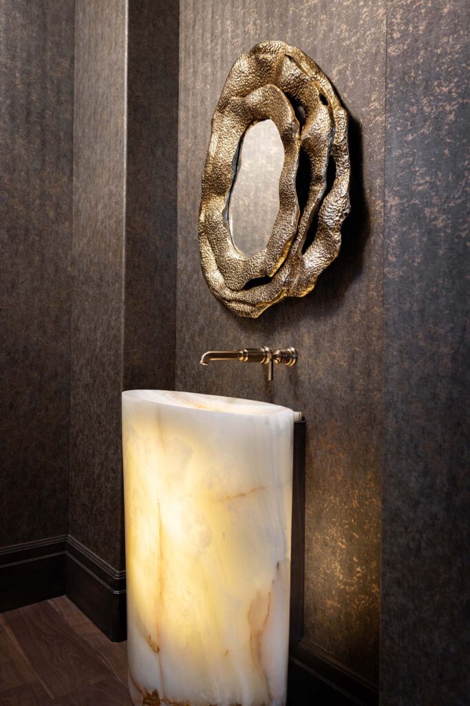 elegant mountain modern bathroom backlit onyx